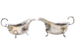 A pair of silver sauce boats by Adie Brothers Ltd.