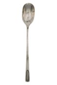 A silver condiment spoon by Gwen Whicker.