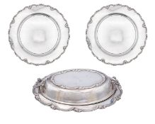 A Peruvian sterling silver three-piece serving set.