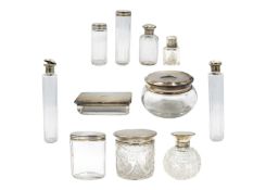 A collection of silver topped bottles and jars.