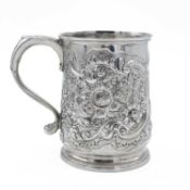 An early George III silver embossed half pint mug by Thomas Whipham & Charles Wright.