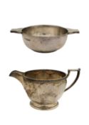 A George V silver quaichs by William Hutton & Sons Ltd, and a milk jug by Harrison Bros & Howson.