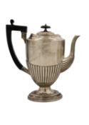 A Victorian silver half fluted pedestal hot water jug by John Millward Banks.