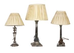 Three silver-plated converted candlesticks.