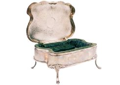 An Edwardian silver jewellery box by Walker & Hall.