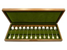 A cased set of twelve silver royal horticultural society flower spoons.