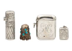 A selection of four small silver items,