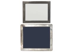 Two silver photo frames.