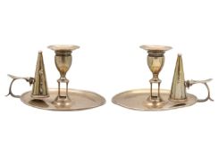 A George III silver pair of chambersticks by John Crouch I & Thomas Hannam.