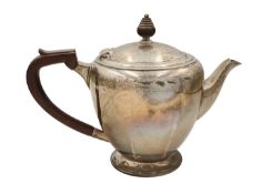 A George VI silver ovoid pedestal teapot by Roberts & Belk Ltd.