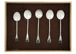 A collection of five Arts & Crafts style silver coffee spoons with chrysoprase finials by Gwen Whick