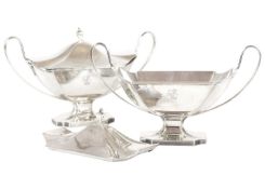 A good pair of George III silver twin-handled pedestal lidded sauce tureens by John Robins.