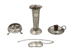 A selection of four small silver items.