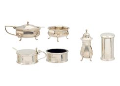Two silver three-piece cruet sets.