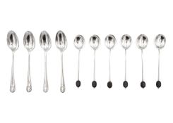 A silver set of six coffee bean spoons and a set of four silver shell pattern coffee spoons.