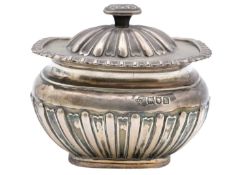 An Edwardian silver tea caddy by Horace Woodward & Co Ltd.