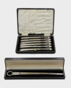 A cased silver paper knife by Warwickshire Reproduction Silver.