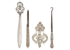 A Victorian silver chatelaine clip, button hook, pen knife and letter opener.