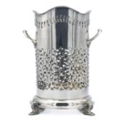 A George V silver siphon or wine bottle holder by Copper Bros.