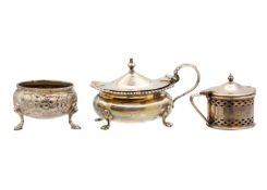 Three silver cruets and a silver lid. T