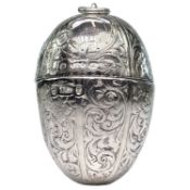 An unusual Victorian silver egg shaped vinaigrette by Aston & Son.