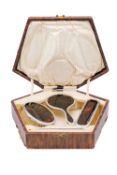 A cased child's silver and tortoiseshell dressing set by Adie Brothers Ltd.
