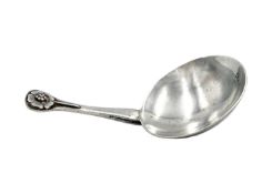 A silver tea caddy spoon by Gwen Whicker.