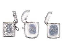 A group of three hallmarked silver vesta cases.