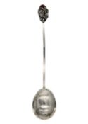 A silver Arts & Crafts style condiment spoon by Gwen Whicker.