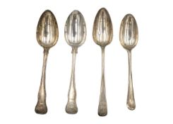 A selection of four silver table spoons.