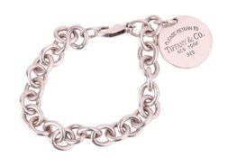 A Tiffany and Co. Sterling Silver bracelet with large round jump ring links and a Tiffany & Co. 
