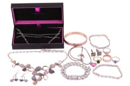A mixed collection of jewellery items including a 9ct white gold diamond halo ring with split should