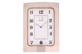 A Dunhill stainless steel quartz travel clock Model: 06.03581 Case Material: stainless steel Case di