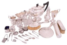 A silver sugar castor of octagonal baluster form, a three-piece silver condiment set, the salt and m