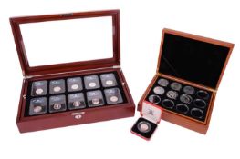 A collection of coins including a Royal Mint Queen Elizabeth II 50p Victoria Cross Medal coin, seale
