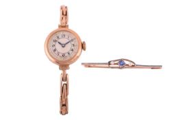 A late 1930s 9ct gold ladies wristwatch, with a mechanical 5-jewel movement, the cream face with Ara