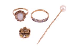 A collection of mixed jewellery items including a cultured pearl stick pin in yellow metal tested as