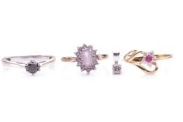 A mixed group of jewellery comprising a black diamond solitaire ring, featuring a claw set round bla