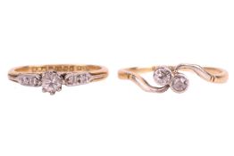 An Edwardian Toi et Moi diamond ring and a diamond solitaire ring; the Edwardian ring features two o