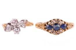 A late Victorian sapphire and diamond dress ring, the three oval blue sapphires are centrally set an
