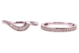 Two diamond-set rings; the first, a half-eternity ring set with twenty round brilliant diamonds in a