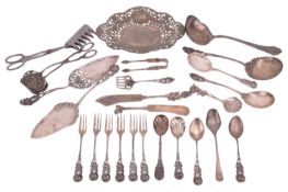 A collection of mixed items comprising matching utensils with rose and foliage design by Kohlbecker 