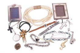 A mixed collection of jewellery and silver items including a Yves Saint Laurent gilt bow costume nec