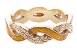 A yellow guilloché enamel twist ring, comprising two intertwined bands with one engraved with laurel