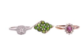 Three gem-set rings including a peridot cluster ring in a 9ct yellow gold mount, size K1/2, together