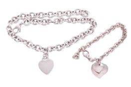 A Tiffany & Co heart necklace, with a Tiffany & Co double heart charm bracelet. The necklace
