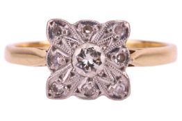 A diamond cluster ring, the quadrilateral head with a centrally set round brilliant diamond, surroun