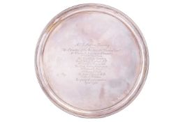A George V silver salver, London 1935 by William Comyns & Sons Ltd, of plain circular form with 