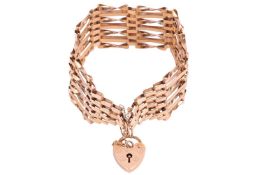 A gold gate link bracelet, the heart-shaped padlock clasp with hallmarks for 9ct gold, the bracelet 