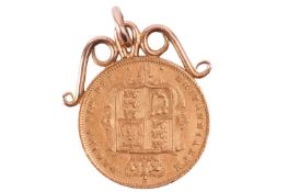 A Queen Victoria half sovereign, 1872, obverse with head to the left, reverse with shield, mounted a